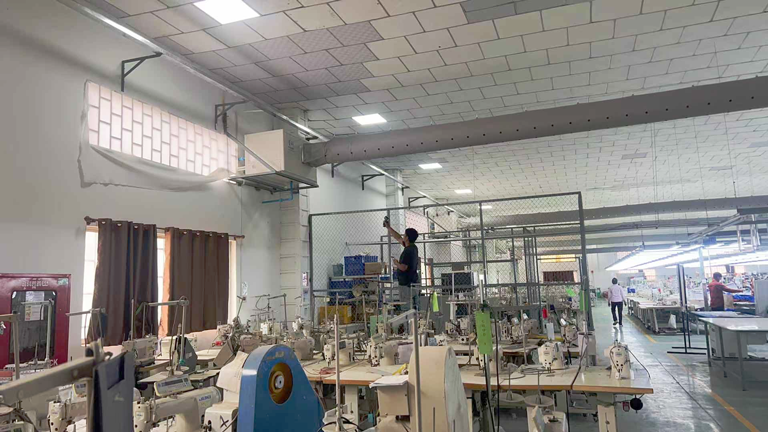 制衣廠區(qū)域降溫，安裝蒸發(fā)冷省電空調(diào)-臥式管道機(jī)組