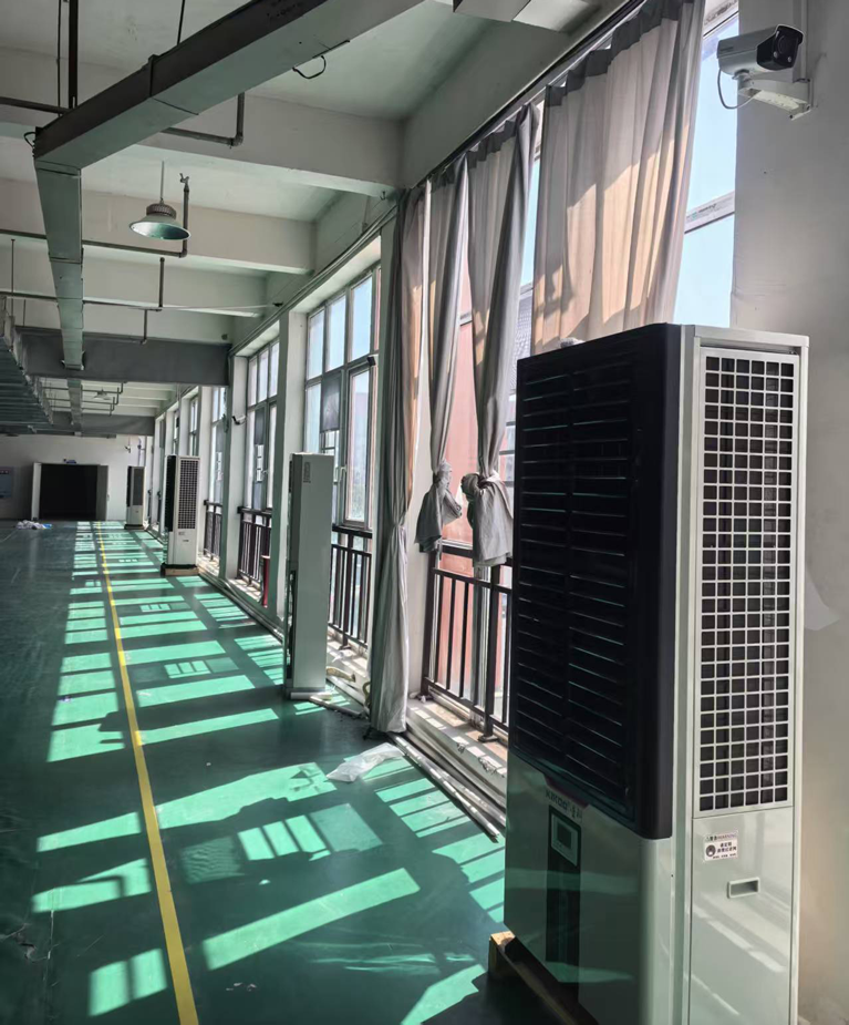 制衣廠整體降溫，應用蒸發冷省電空調-立式軸流雙風口機組